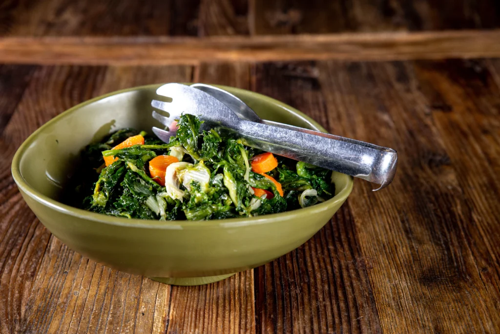 Kale, frozen, cooked, boiled, drained, without salt
